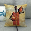 Detailed texture of African tribal art cushion cover on grey sofa with oil painting style - Women in Red and Yellow Outfit Style (7) / 45x45cm