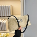 Sac bandoulière en paille tressée beige avec nœud en métal argenté et bandoulière noire - Noir