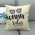 Linen pillow cover with pink sunglasses and Summer Vibes text on grey sofa - Summer Vibes Sunglasses (15)