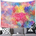 Close-up of a colorful watercolor mandala tapestry on a wall above a modern grey sofa - 100x70 Peach Skin / Multicolor Gradient Mandala (Style 5)