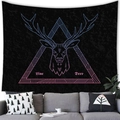 Detail showing neon geometric deer head print on black fabric tapestry hanging over sofa - Neon Gradient Deer Head (Style 10)