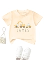 Detailed view of beige kids t-shirt with cartoon construction trucks and James name - 90cm / Apricot