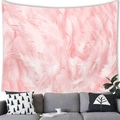 Detail of pink feather pattern tapestry hung on white wall above a modern grey sofa - 100X70 / Peach Skin / Pink Stacked Feather Style