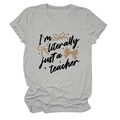 Detail view of light gray cotton t-shirt with teacher text and leopard bows print - S / Tops / Light Gray