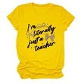 Detail of teacher slogan print with leopard bows on yellow cotton t-shirt fabric - S / Tops / Yellow