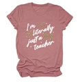 Close-up of pink crewneck T-shirt with I'm literally just a teacher text and leopard bows - S / Rose Gold (White Text)