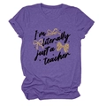 Detail of heather purple teacher t-shirt featuring leopard bows and star graphics - S / Tops / Purple