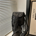 Black pebbled leather crossbody bag featuring bohemian long tassels and silver studs - Black