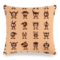 Detail of linen cushion featuring brown cartoon monster patterns on beige fabric - Cartoon Little Monster