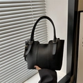 Chic black lychee grain leather tote bag with gold hardware for office commuting - Black