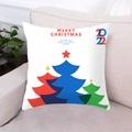 Dettaglio della federa con alberi di Natale colorati posizionata su un divano beige - Bianco Albero di Natale Multicolore Merry Christmas (5)
