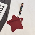 Deep red star shaped coin purse in pebble leather with Love strap and gold heart zipper - Burgundy