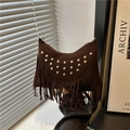 Bohemian dark brown suede dumpling bag with gold studs and long fringe details - Brown