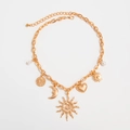 Bohemian gold celestial charm necklace with sun, moon, heart pendants and white pearls - Sun Moon Heart (07219) / Sun Moon Heart Style (07219)