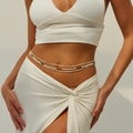 Detail of layered bohemian waist beads in pearl white, gold, and brown on a woman's waist - Mixed Colors (6252)