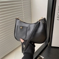Bolso de media luna minimalista en cuero PU negro con cremallera dorada y bolsillo frontal - Negro
