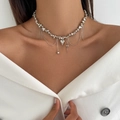 Silver multi-layer necklace with heart pendants and elegant fringe chain on model - Silver Metal Bead Heart Necklace / Heart Tassel Style (07241)