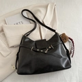 Vintage black faux leather tote bag with gold eyelet straps and plush bear charm - Black with Charm