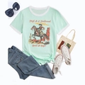 Flat lay of mint green T-shirt with vintage cowboy print and white contrast neck trim - Sky Blue