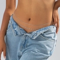 Detail of silver double-layered snake chain and textured waist chain on model - White K-06329