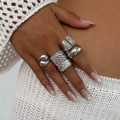 Silver-toned ring set with square zircon and textured bands styled on a model's hand - Silver Square Rhinestone Style (06111)