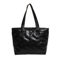 Minimalist black quilted down tote bag with shiny finish and woven handles - Black