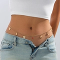 Detail of gold layered waist chain with charms on a model wearing denim jeans - Gold (1841)