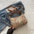 Vintage floral canvas bucket bag in beige with colorful patterns and brown strap - Brown