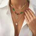 Three-layer gold necklace set featuring sun pendant, colorful beads, and white pearl - Gold