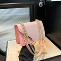 Pink chain strap crossbody bag with diagonal quilted texture and gold metal accents - Pink