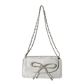 Silver square crossbody bag featuring a large sparkling rhinestone bow and chain strap - Silver