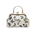 Elegante borsa avorio con ricamo a farfalla dorata e manico ad anello in metallo chic - Bianco