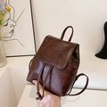 Mini vintage brown leather backpack with drawstring closure and slim shoulder straps - Brown