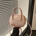Roze PU-leren mini handtas voor dames met gouden accenten en modieuze reliëfopdruk - Roze