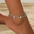 Chevillère multicouche argentée avec breloques clé et cadenas sur la plage - Chevillère Pendentif Serrure et Clé Argentée (2117)