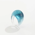 Detail of teal resin ring featuring a glossy dome shape and transparent water-like texture - Transparent Blue-0930