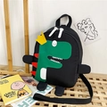 Leuke zwarte dinosaurus rugzak voor kinderen met groen drakenpatroon en gele kroon detail - Klein / Zwart