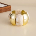 Detail of wide elastic bracelet with gold metal plates and white marble resin segments - Off-White (03012)
