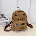 Brown cat-themed leather backpack with ears and whiskers in a lifestyle setting - Cat Shape / Khaki