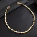 Detail of hip hop trouser chain with irregular gold beads, pearls, and lobster clasps - Gold (01971)
