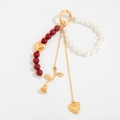 Detalle del colgante para bolso de perlas con rosa y corazón de estilo retro - Dorado (00077)