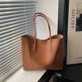 Minimalist caramel brown large tote bag in textured leather with thin shoulder straps - Brown