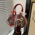 Leopard print Boston bag with red leather handles and cute cherry pearl charms - Red Leopard Print