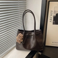 Dark brown tote bag in oil-wax faux leather with cute puppy charm and belt buckle detail - Brown