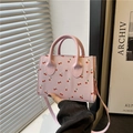 Pink mini crossbody tote bag with red cherry print and slender leather shoulder strap - Pink
