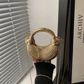 Golden acrylic shell bag with horizontal texture, metal handle and chain for evening wear - Gold