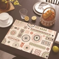 Linen placemat with Mexican tribal pattern on dark wood table for dining room decor - 30cm x 45cm