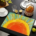Mexican style linen placemat with bright sun pattern on a black table setting - Abstract Hand-drawn Sun