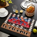 Dettaglio della tovaglietta in lino USA con camion rosso e scritta Welcome sul tavolo da pranzo - Stile Camion Rosso USA Welcome (Stile-9)