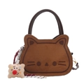 Brown cat shaped saddle bag with embroidery and plush pendant on white background - With Pendant / Brown